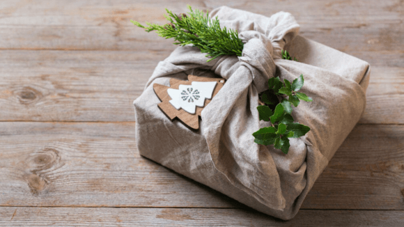 white flowers tied with a golden ribbon. 