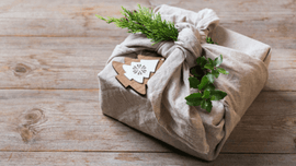 white flowers tied with a golden ribbon. 